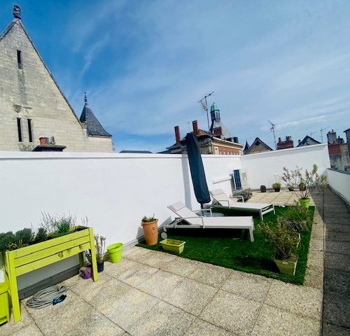 Très bel appartement coeur de centre-ville avec terrasse plein sud sans vis-à-vis-2 places de parking