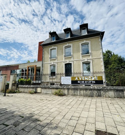 Locaux professionnels avec 16 stationnements et ascenseur